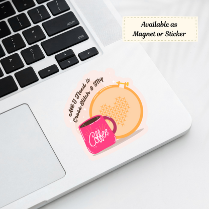 “All I Need is Cross Stitch & My Coffee” sticker on a laptop corner, showing cozy crafting theme