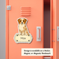 Dog-shaped name tag with 'Max' on a pink locker.