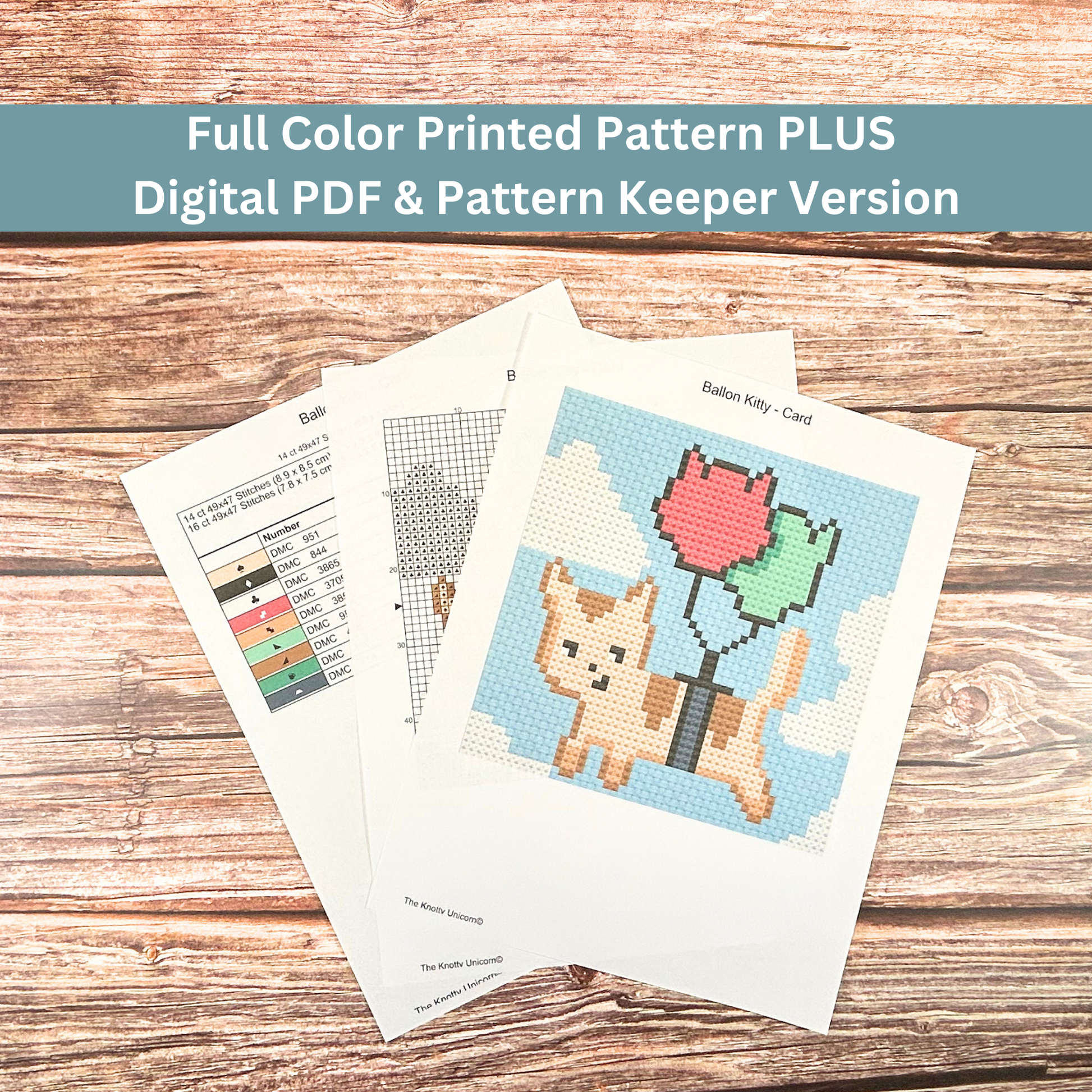 Printed cross-stitch pattern sheets for a floating cat with balloons design, including a color key and stitch guide.