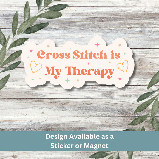 Sticker with “Cross Stitch is My Therapy” text on whitewashed boards