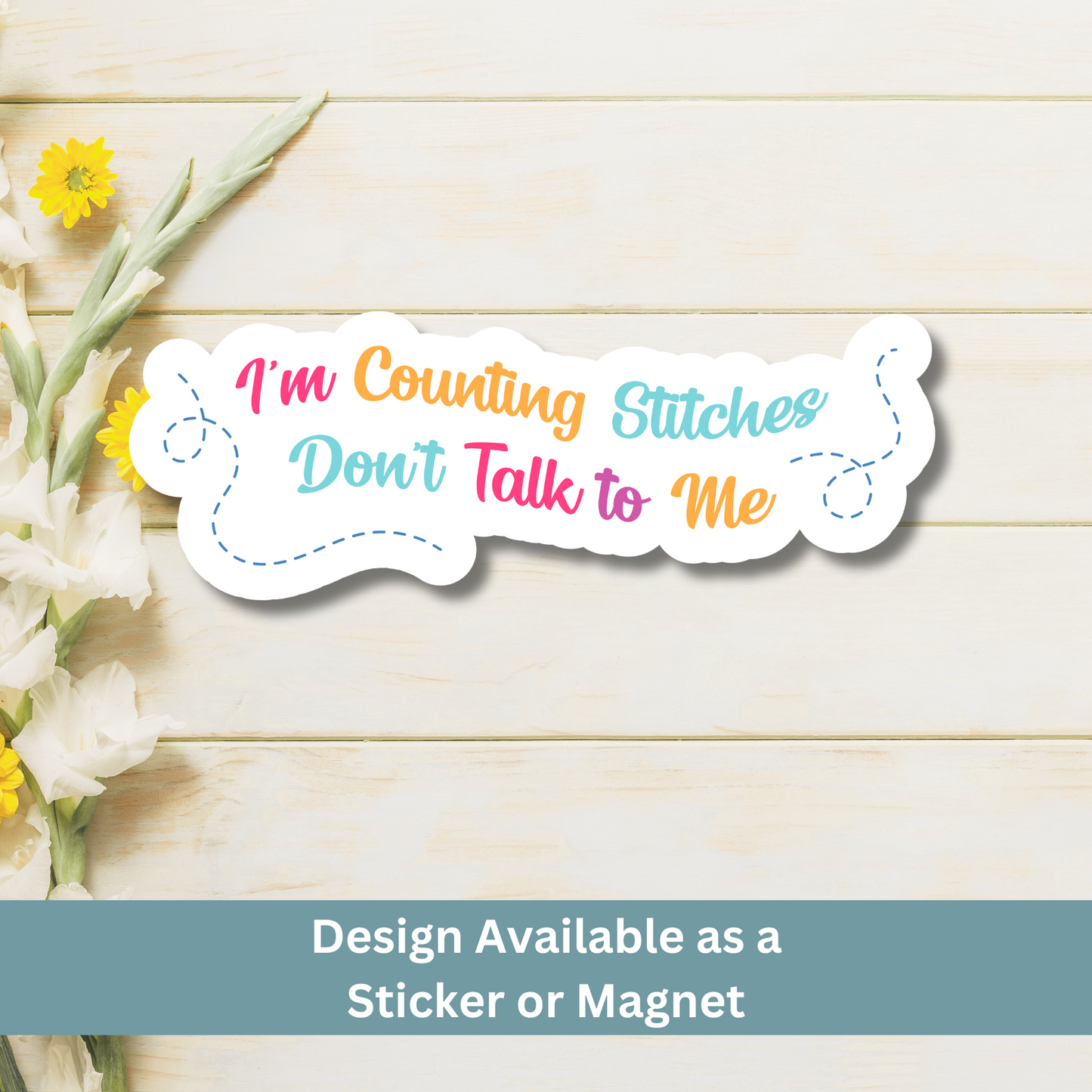 Magnet of “I’m Counting Stitches Don’t Talk to Me” on light wood flat lay