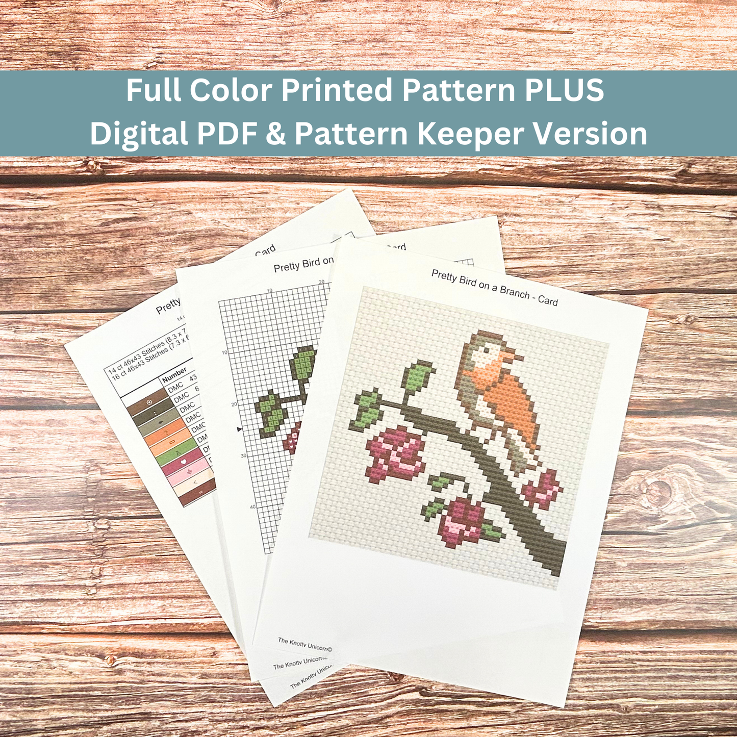 Printed cross-stitch pattern sheets for a bird on a branch design, including a color key and stitch guide.