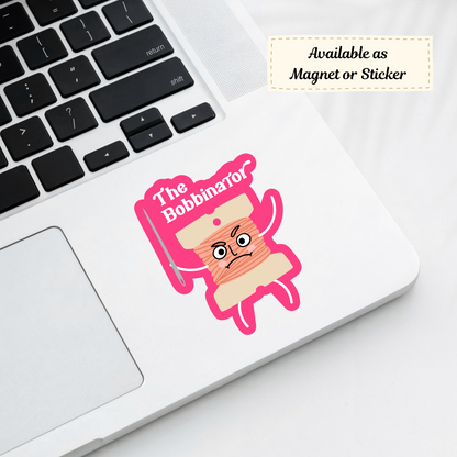 ‘The Bobbinator’ sticker placed on laptop corner, fun gift for cross stitch fans
