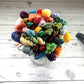 Assorted CXC six-strand cotton floss skeins in DMC-compatible colours